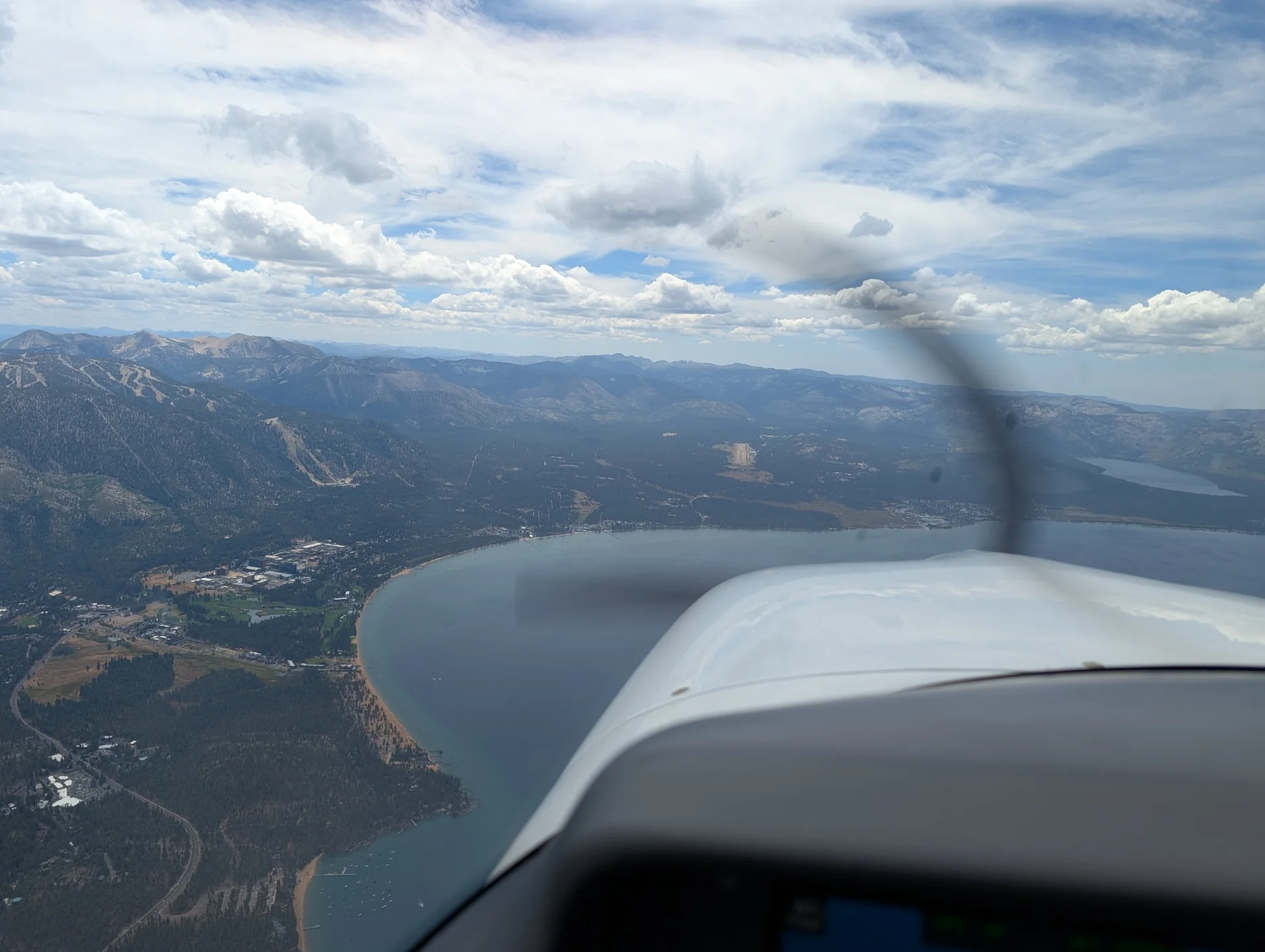 Lake Tahoe and the Sierra Nevada seen over the nose of N721TP