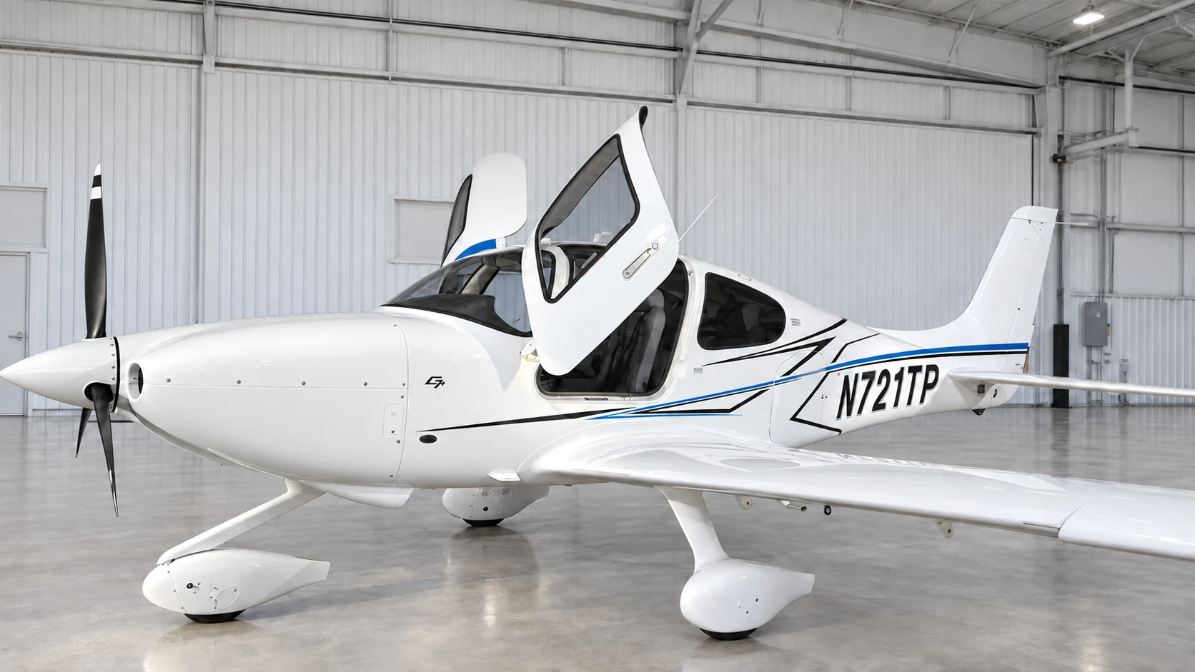N721TP in a neutral hangar; lighting, background and registration tone edited